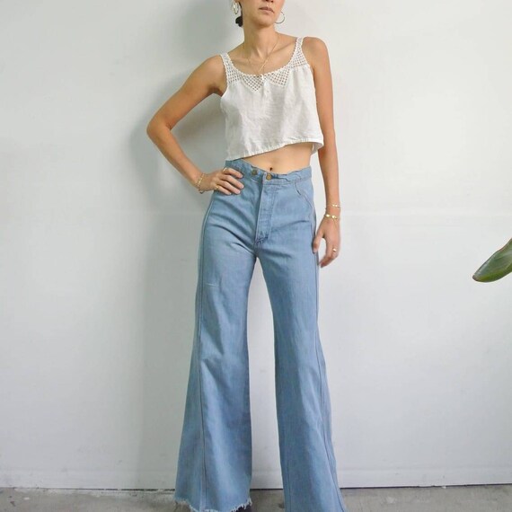 Vintage 1970s high waist light blue distressed fla