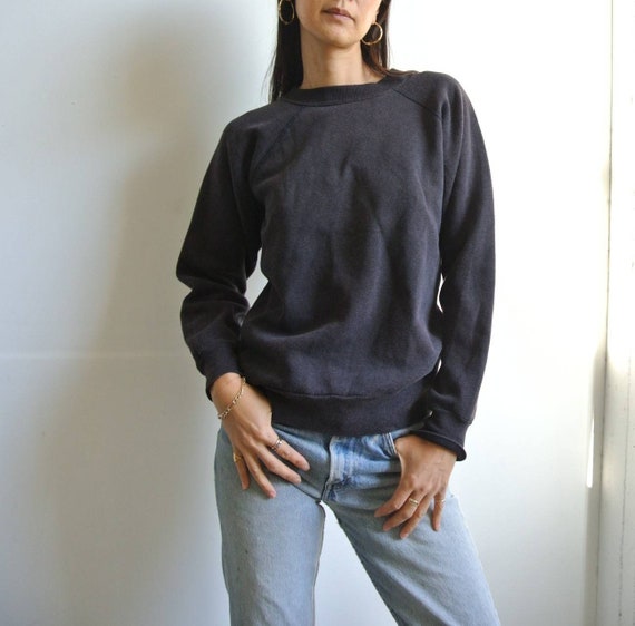 Vintage 1970s faded black raglan sweatshirt