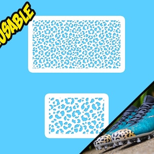 May include: Two white reusable stencils with a leopard print design. The stencils are on a light blue background. The stencils are for use on shoes or other surfaces.