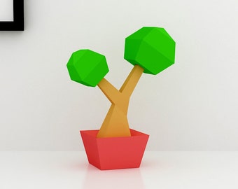 May include: A low-poly style green plant with two branches in a red pot. The plant is on a white surface.
