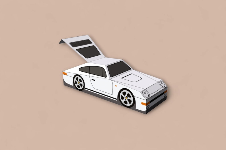 May include: A white sports car illustration with black accents, including wheels and window trim. The car has a detailed design, with a raised rear section. The background is a solid tan color.