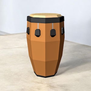 May include: A brown conga drum with a black rim and accents. The drum has a geometric design and is set on a light-colored surface. The drum is a musical instrument.