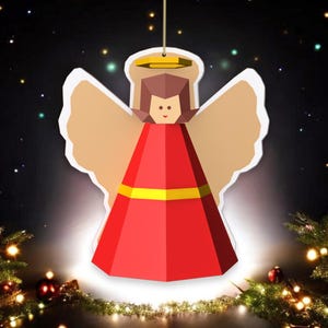 May include: A red and gold angel ornament with white wings. The angel is hanging from a string and is surrounded by a dark blue background with white stars.