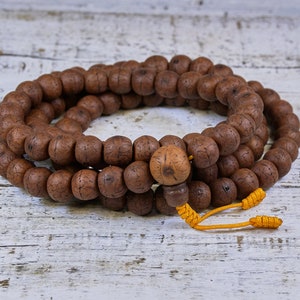 108ct 11mm Flat-Sided Phoenix Eye Bodhi Seed Mala from Nepal (Dark)