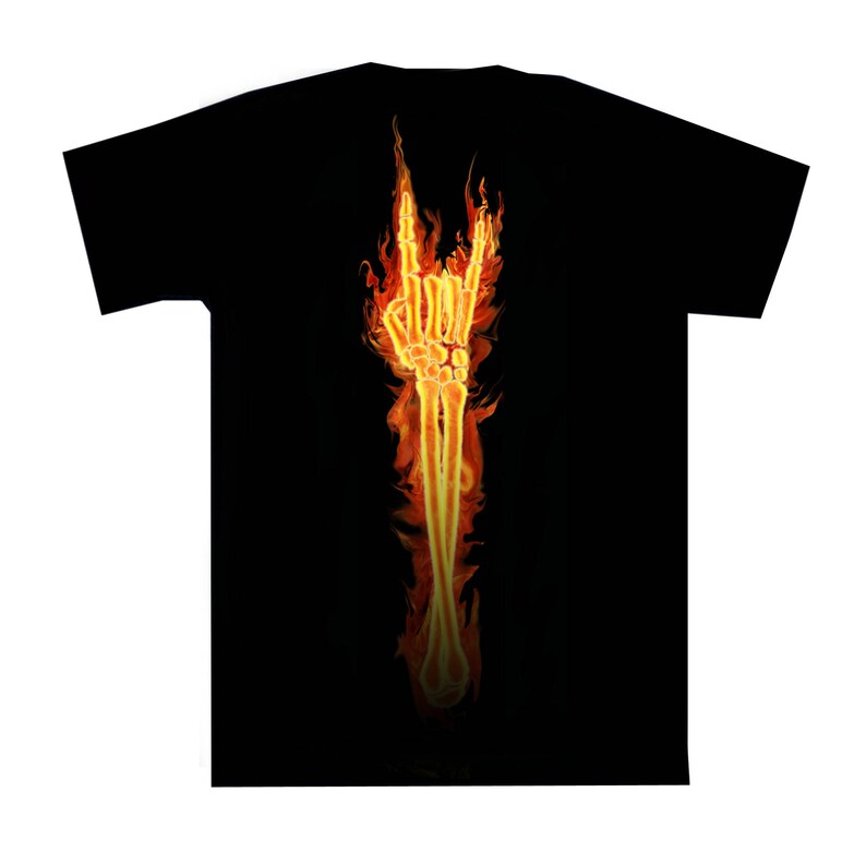 May include: Black t-shirt with a graphic of a fiery skeleton hand making the rock and roll hand gesture.