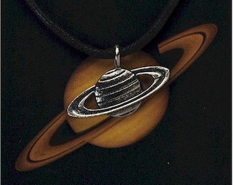 Saturn Silver Pewter Pendant On A Waxed Cord