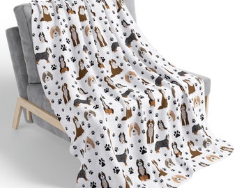 May include: White fleece throw blanket with a repeating pattern of black paw prints and colorful illustrations of Bernese Mountain Dogs.