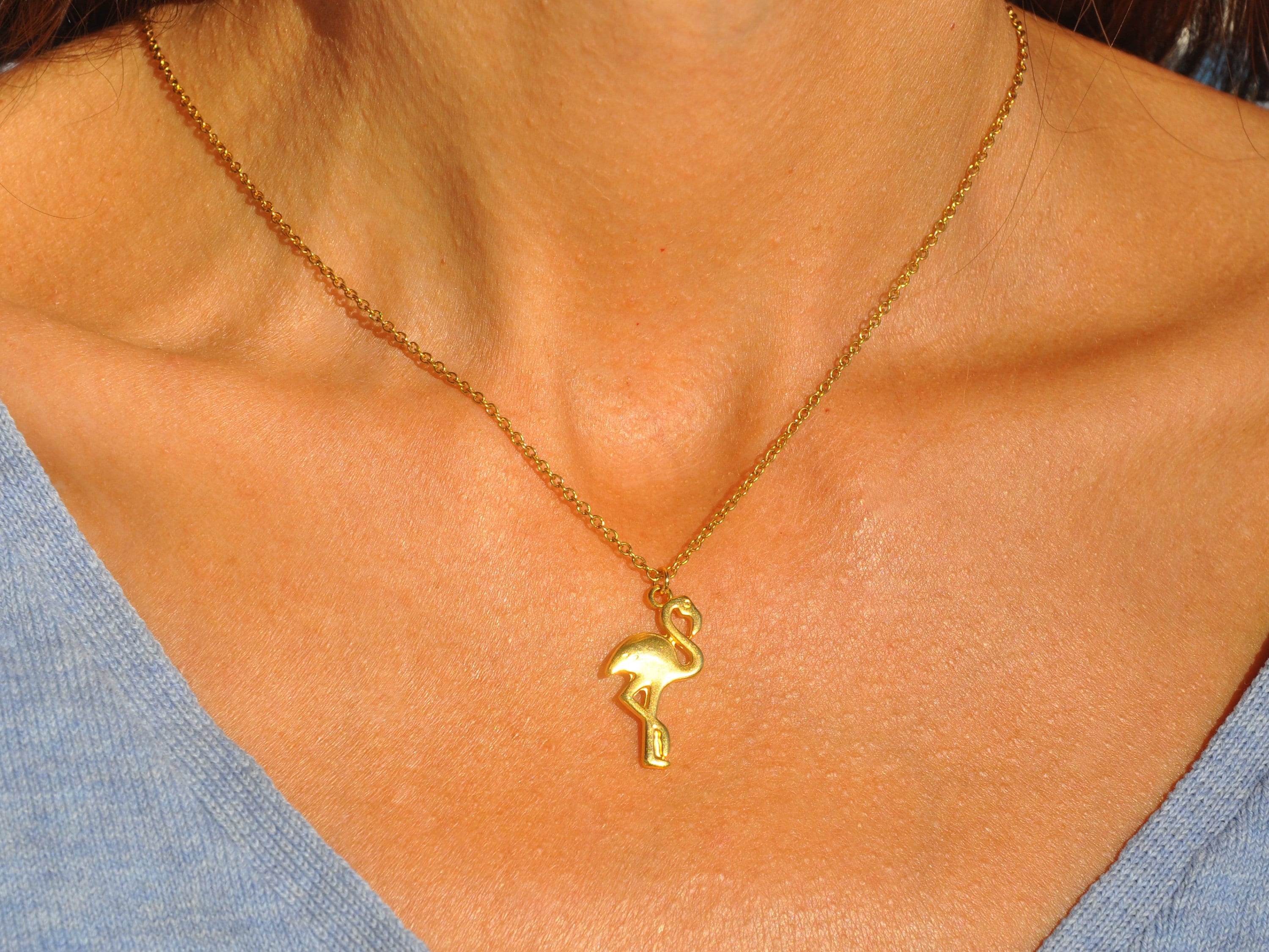 Gold flamingo best sale pendant