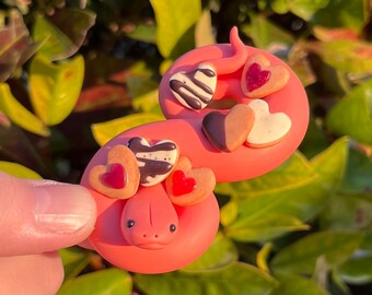 Valentine's Cookie-munching Snake (coral/blush pink) | Handmade Polymer Clay Snake Figurine