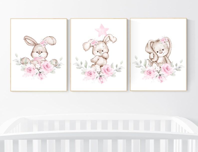 May include: Three watercolor illustrations of cute animals with pink flowers. The first image features a brown bunny with a pink bow, the second image features a brown bear with a pink bow and a star, and the third image features a brown bear with a pink bow.