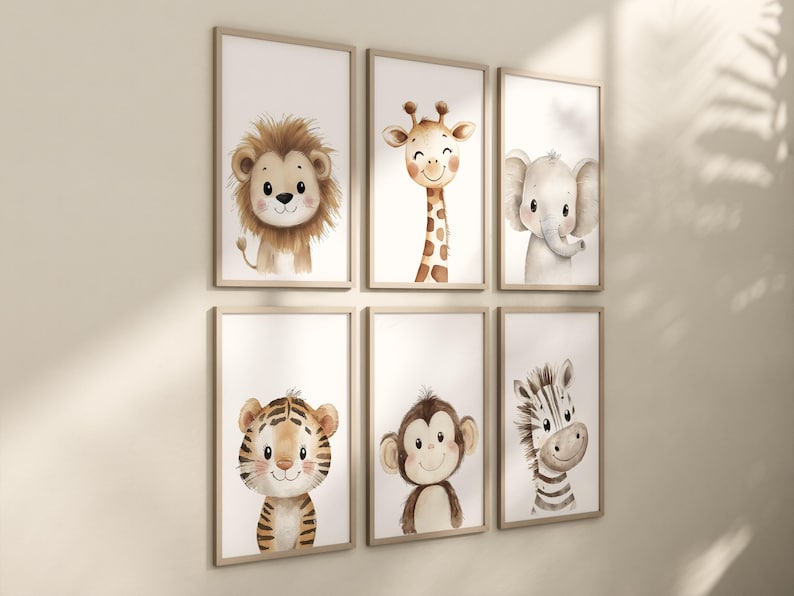 May include: Six framed prints featuring watercolour illustrations of various animals, including a lion, giraffe, elephant, tiger, monkey, and zebra. Each print has a white background and is framed in a light brown wood frame.