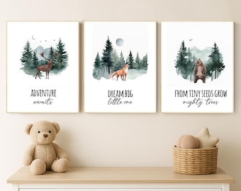 May include: Three framed watercolor prints with forest scenes and animals. The prints feature a deer, fox, and bear, with text that reads "Adventure awaits," "Dream big little one," and "From tiny seeds grow mighty trees."