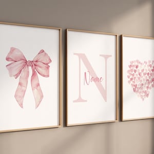 Stampa per cameretta dei bambini con fiocco rosa: decorazione murale con fiocco acquerello