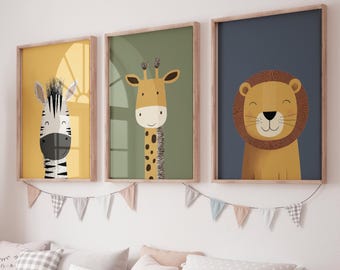 May include: Three framed animal art prints. The first features a zebra on a yellow background, the second a giraffe on a green background, and the third a lion on a blue background. Each print has a wooden frame.