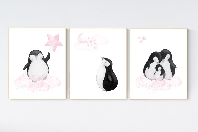 May include: Three watercolor illustrations of penguins on a pink cloud background. The first penguin is holding a pink star. The second penguin is looking up at a pink cloud with a crescent moon and stars. The third penguin is huddled with two other penguins.