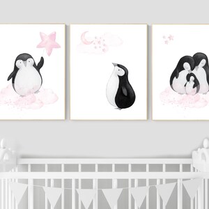May include: Three watercolor paintings of penguins on a pink cloud background. The first painting shows a penguin holding a pink star. The second painting shows a penguin looking up at a pink cloud with stars. The third painting shows a family of penguins huddled together.