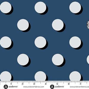 May include: Navy blue fabric with a repeating pattern of large, light gray circles. Each circle has a dark shadow, creating a 3D effect. The fabric has a ruler along the bottom edge with the Andover Fabrics logo.