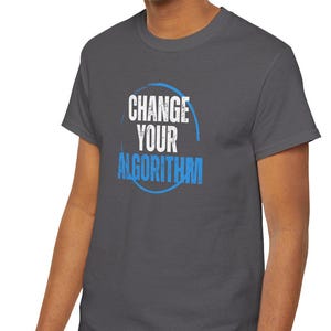 May include: A dark gray t-shirt with a blue circle and the text "Change Your Algorithm" in white.