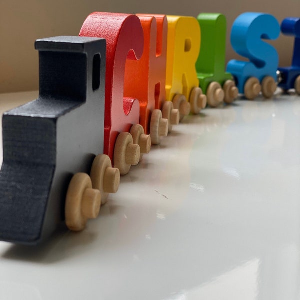 Build your own Train with bright colorful letters. Personalized Wooden Magnetic Alphabet Letters. Engine and Wagon Included.