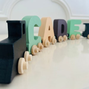 Build your own Train with our Sage Beige colors. Personalized Wooden Magnetic Alphabet Letters. Engine and Wagon Included.