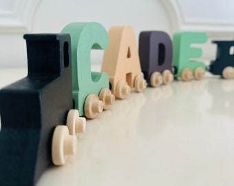 Build your own Train with our Sage Beige colors. Personalized Wooden Magnetic Alphabet Letters. Engine and Wagon Included.