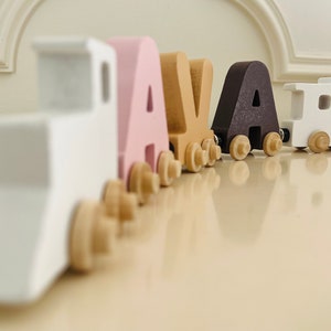 Build your own Train with our Neutral Pink Train. Personalized Wooden Magnetic Alphabet Letters. Engine and Wagon Included.