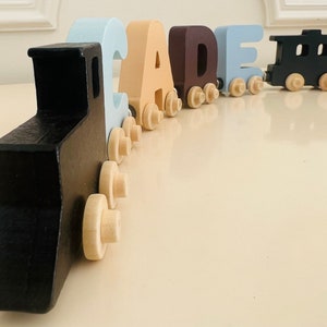 Build your own Train with our Neutral Blues Train. Personalized Wooden Magnetic Alphabet Letters. Engine and Wagon Included.