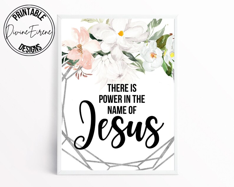 May include: A white printable art print with a floral design and the text "There is power in the name of Jesus".