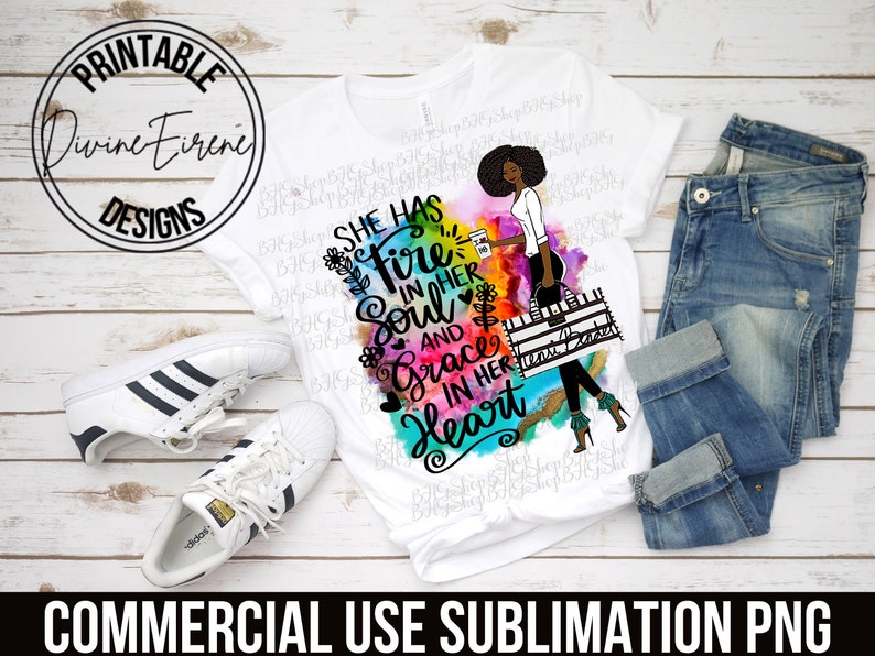 May include: A white sublimation transfer design featuring a woman with a coffee cup and a quote that reads "She has fire in her soul and grace in her heart".
