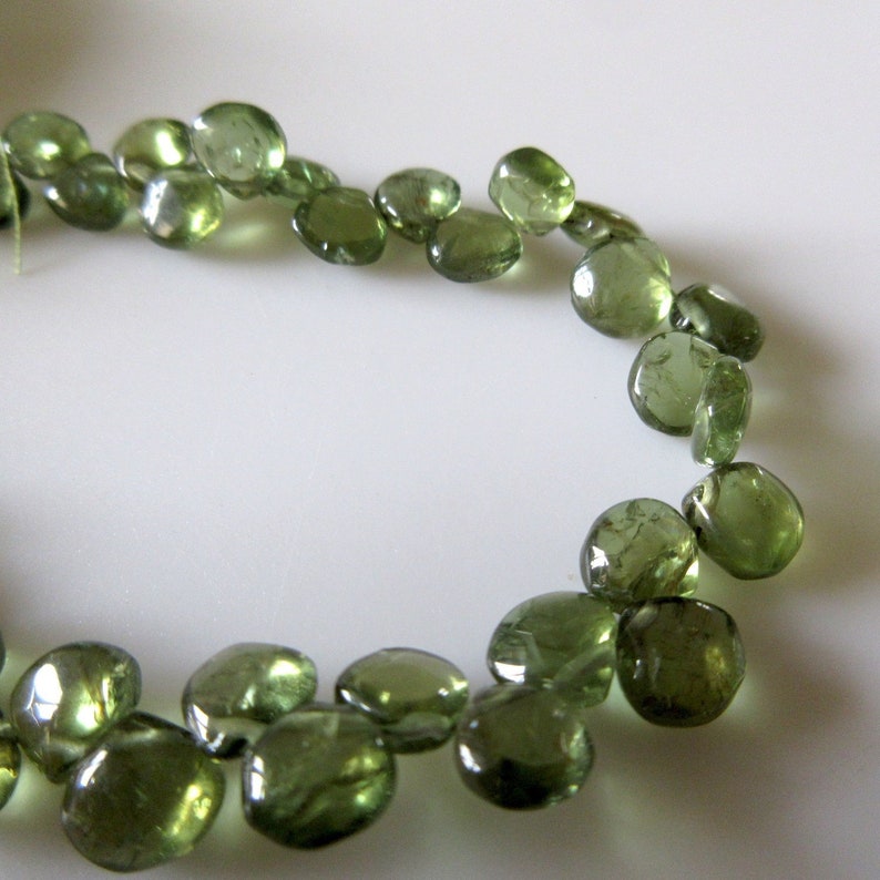 Natural Apatite Smooth Heart Shape Briolettes Apatite Beads 6-8 MM 8 Inch Strand Natural Apatite Smooth Heart Shape Briolettes Apatite Beads 6-8 MM 8 Inch Strand