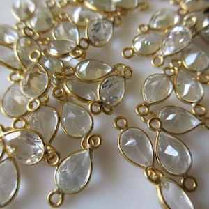 20 stycken 5 mm vit topas päronformad fasetterad sterlingsilver förgylld med dubbla hängen, smyckeskopplingar med 2 öglor, GDS401/2