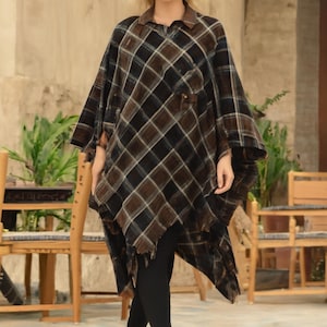 this wrap can be worn with a casual or formal dress and is large enough to be wrapped around, draped loosely as a poncho or even tied with a belt.