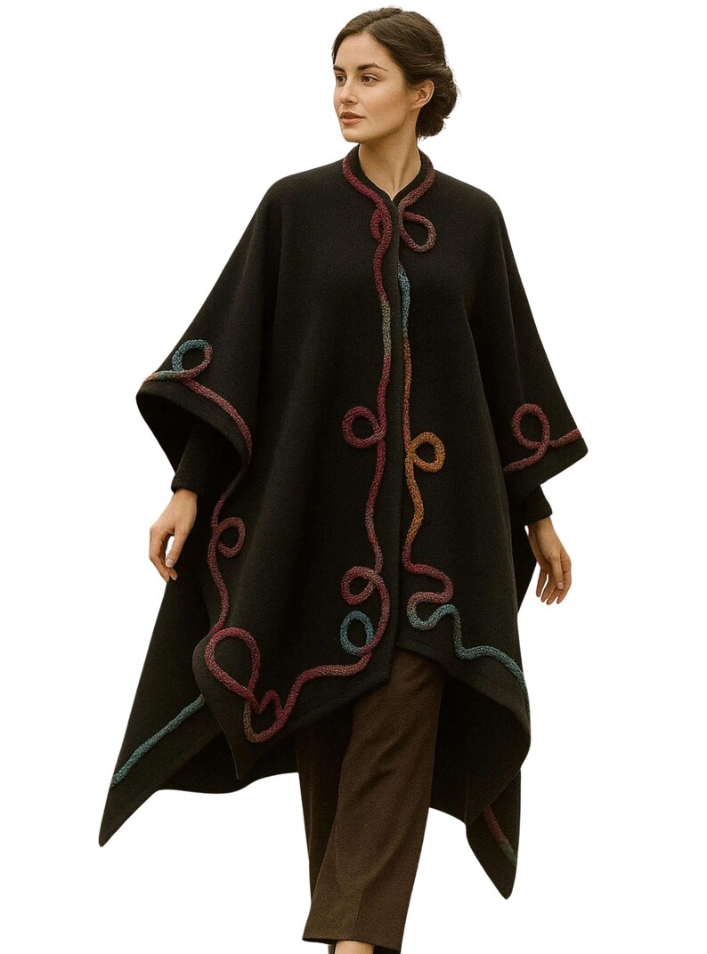 Elegant Cashmere Long Cape, Poncho by exquisite artisan cord embellishment trim, and featuring a seamless circular cut, elegant drape, and one-size oversized silhouette, Showcasing on a live model front view