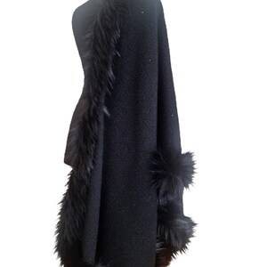 Back view of the shimmering heavy wool tweed cape, accentuated with full fur edging and delicate sequin sparkle, handmade for winter elegance.”
