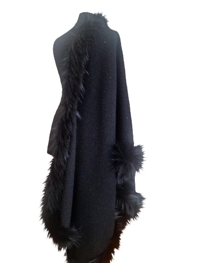 Back view of the shimmering heavy wool tweed cape, accentuated with full fur edging and delicate sequin sparkle, handmade for winter elegance.”