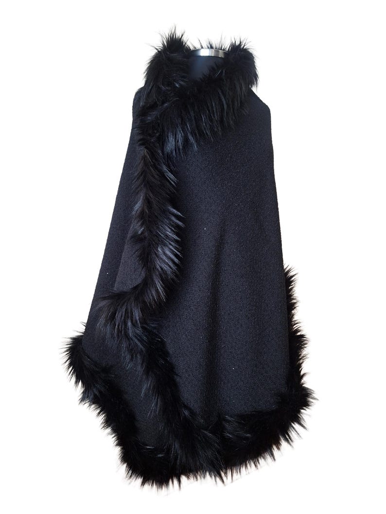 “Side view of the elegant black tweed shawl with fluffy  fur border, revealing the textured heavy fabric and refined winter glamour.”