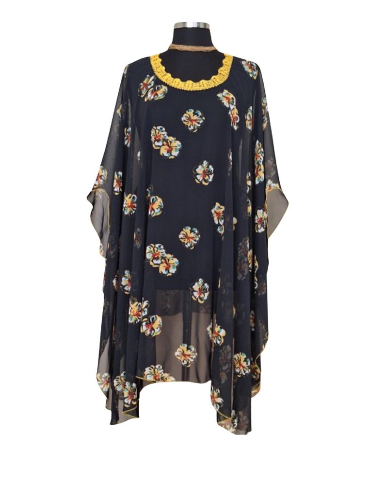This Timeless elegant handmade kaftan dress featuring floral print, fairy edging hem and beautiful handmade lace oya collar.