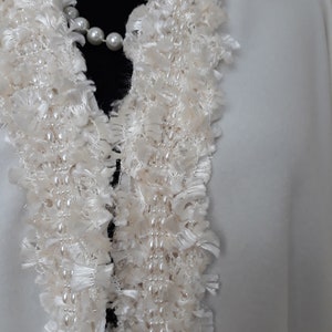 Showcasing of the Ivory Bridal Cashmere Coat, Jacket with Lavish Trim, Couture Evening Cape : Detailed close-up of the handcrafted lavish trim collar with silk yarn and pearls