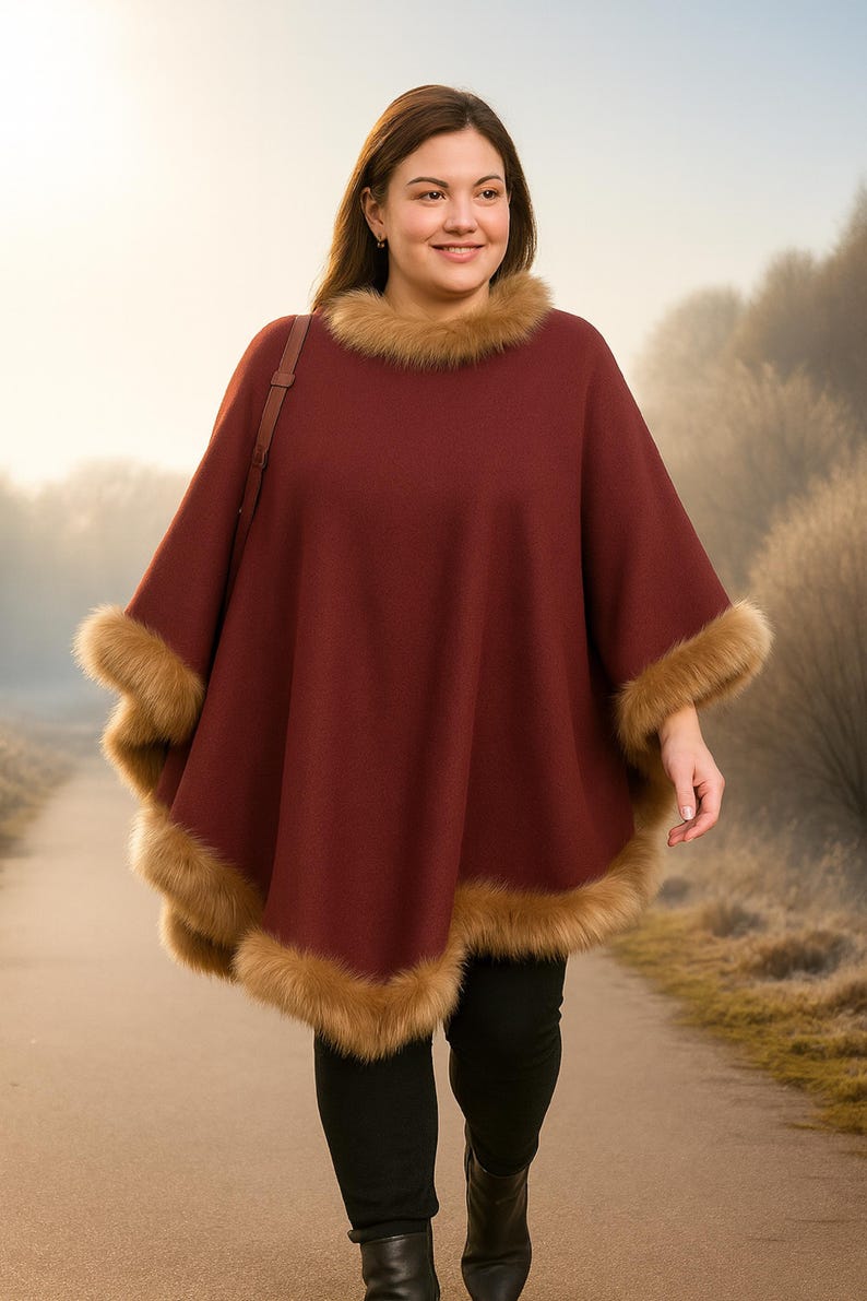 Wrap yourself in timeless elegance with this handmade reversible alpaca poncho cape.