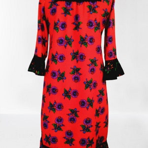 Back view of the Handmade Flannel floral Ruffle Dress, Natural  %100 pure flannel cotton