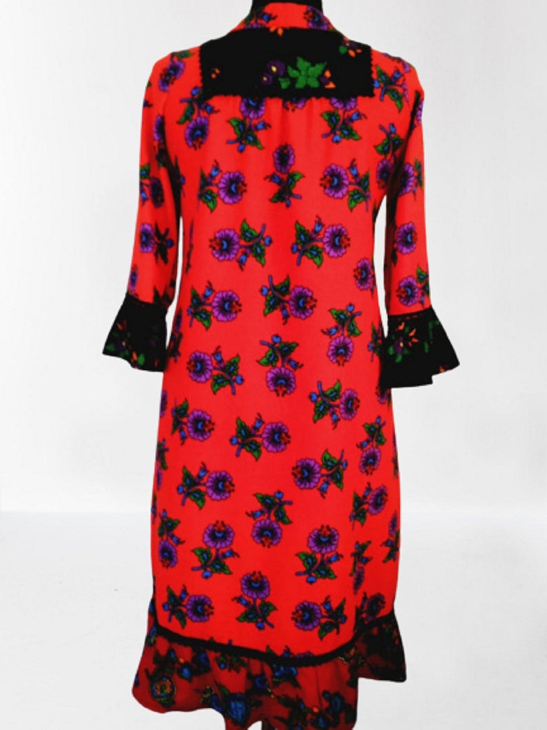 Back view of the Handmade Flannel floral Ruffle Dress, Natural  %100 pure flannel cotton