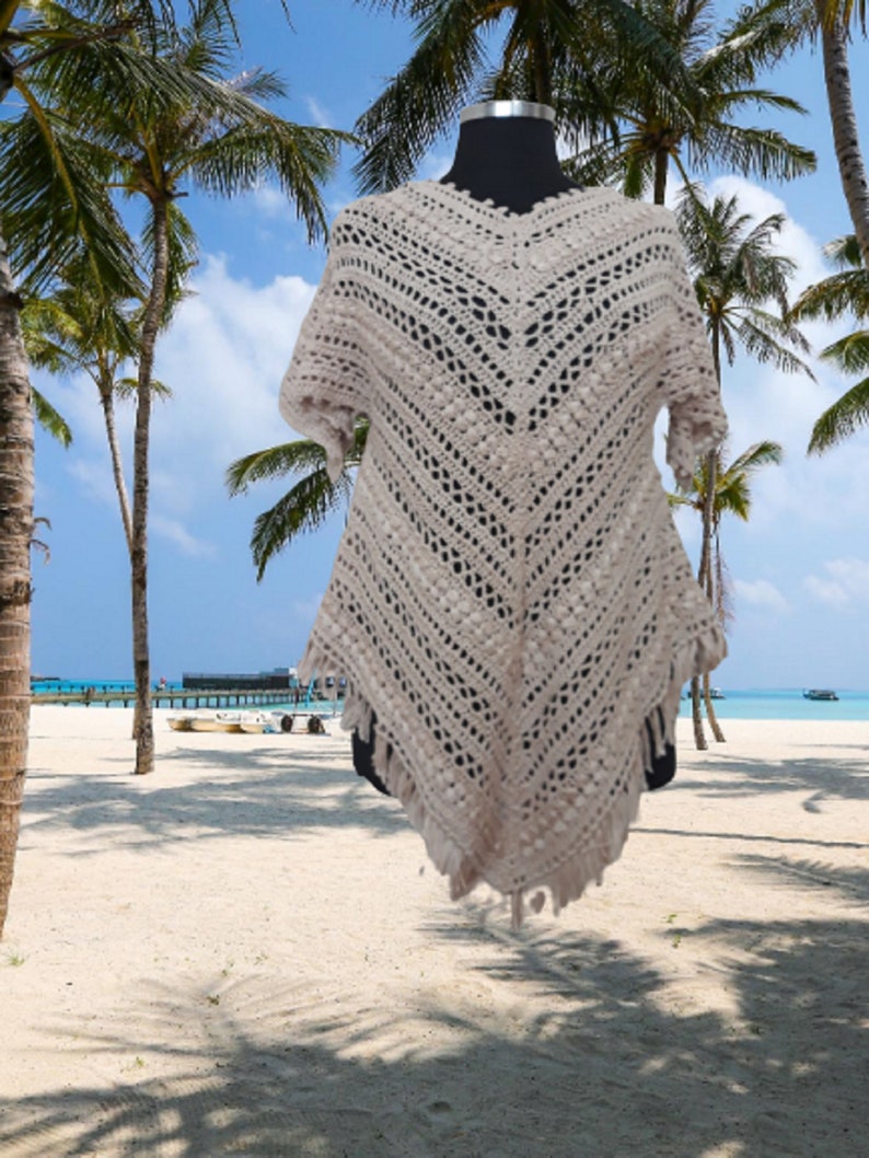 “Oversized hand-crocheted cotton poncho dress for women, perfect for boho festivals, casual summer days, or beachwear.”