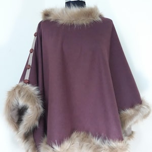 Double face alpaca poncho, plus size clothing
this versatile wrap can be worn on both sides, offering two sophisticated looks in one