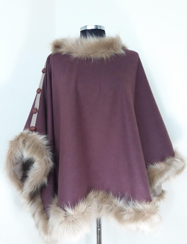 Double face alpaca poncho, plus size clothing
this versatile wrap can be worn on both sides, offering two sophisticated looks in one