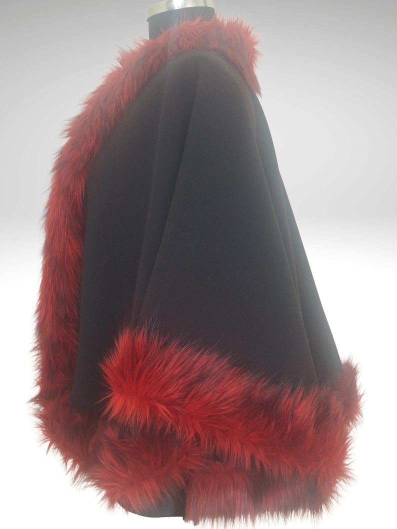 Alpaca Wool Short Cape, Jacket with Red Fur Trim , The garment is displayed on a mannequin against a neutral background, highlighting chic and soft garment