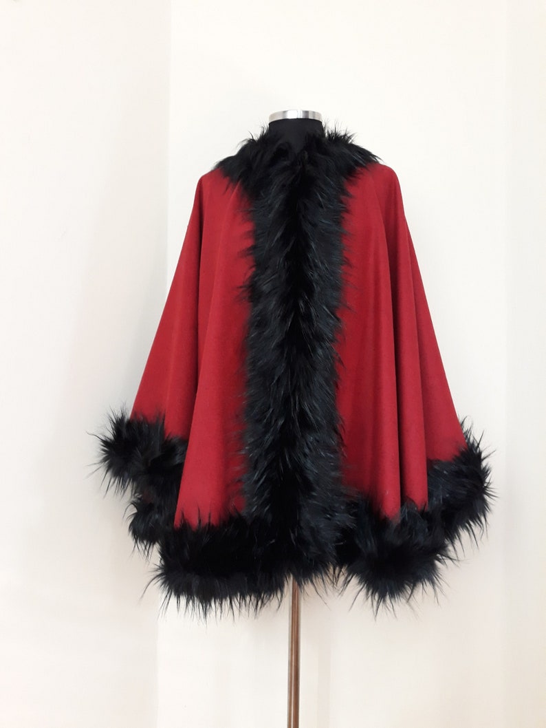 red poncho with fur