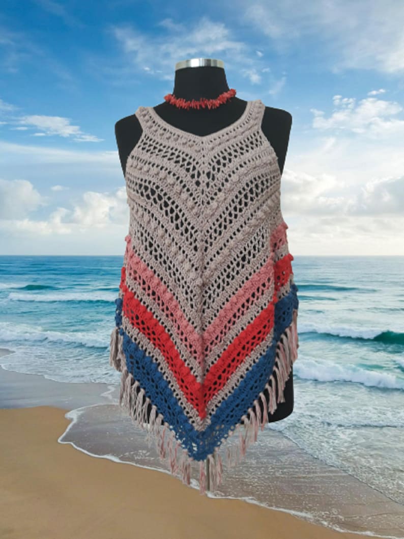 Handcrafted with love, this multicolor mini crochet dress in size L-XL features intricate lace crochet details and is made from soft and breathable cotton.