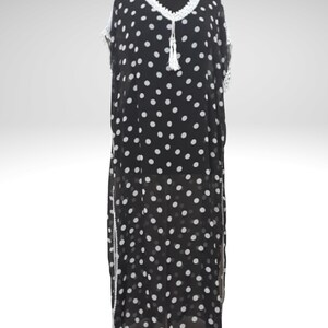 This flowing boho dress  featuring handwork crochet details that add a touch of feminine charm. With a nice loose fit suitable for most body types,comfortable and stylish.