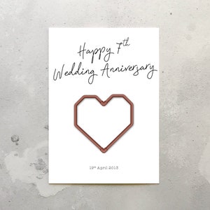 Biglietto per il 7° anniversario di matrimonio. Biglietto con stampa a cuore con pipa in rame per il 7° anniversario di matrimonio. Busta inclusa.