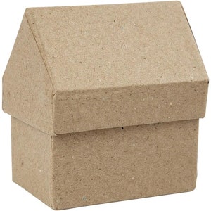 May include: A brown cardboard box shaped like a house. The box is made from recycled paper and has a textured surface.